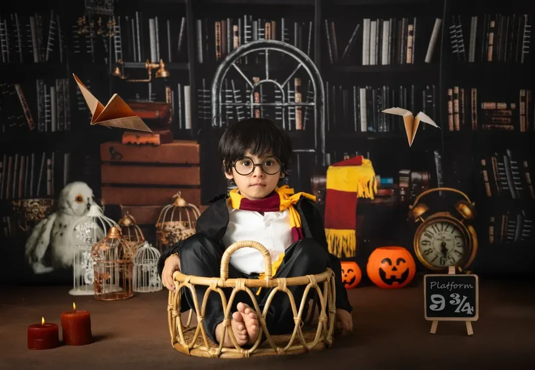 For the little wizard in your life, I create an immersive Harry Potter world. This detailed studio setup includes the iconic Gryffindor scarf, a wand, and a library backdrop to bring the magic of Hogwarts to life.