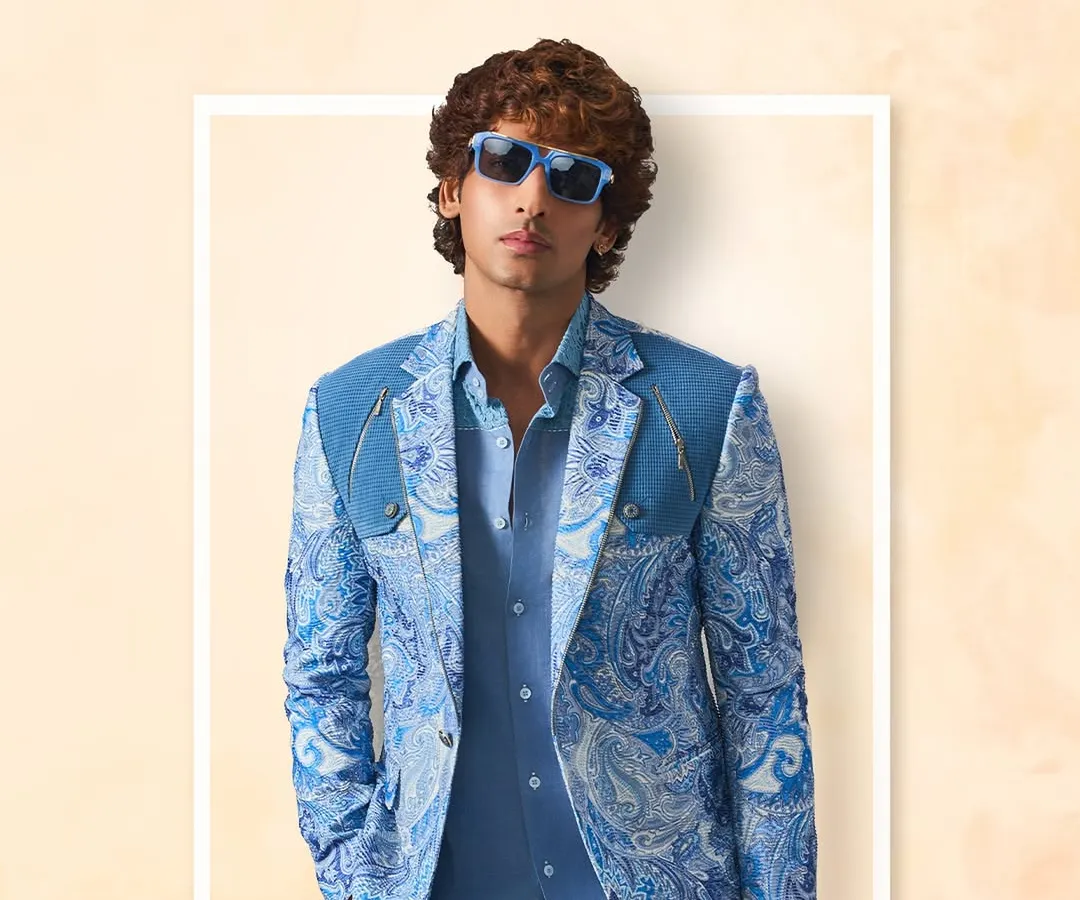 This is for the man who isn't afraid to stand out. My statement-maker blazer features a bold paisley print on a sharp, modern cut, designed to ensure you own every room you walk into.