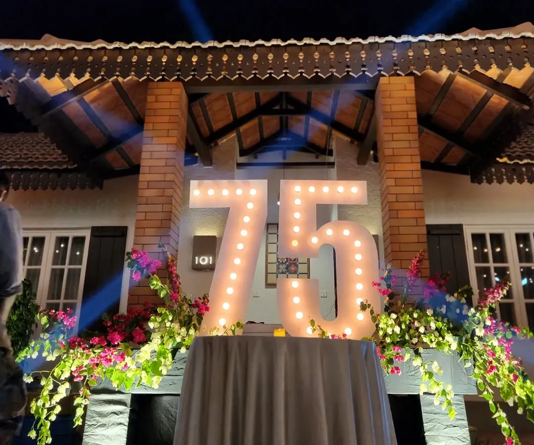 Milestone birthdays deserve to be in the spotlight. We designed these custom marquee light-up numbers for a 75th birthday party, creating a perfect photo opportunity and a focal point for the celebration.