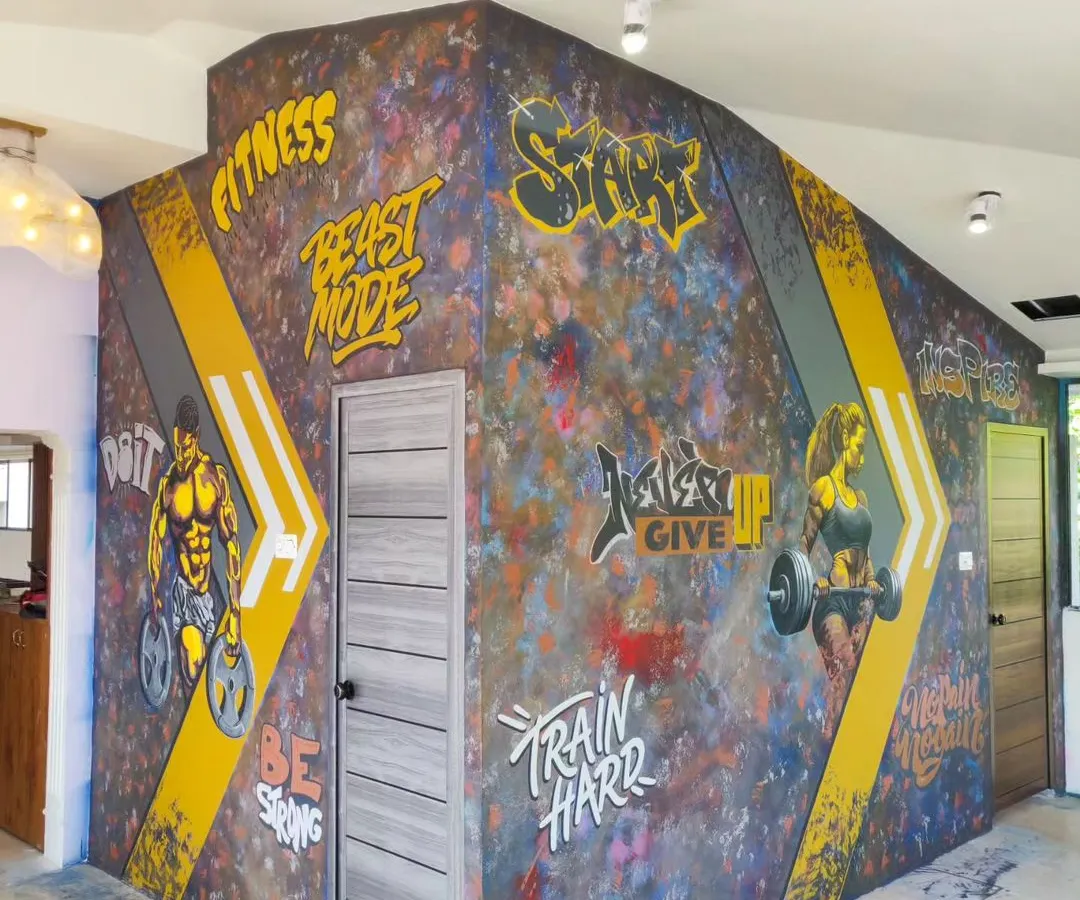 We bring high energy to fitness spaces with dynamic graffiti art. This project for One More Rep gym in Mangalore features motivational text and powerful figures to inspire every workout.