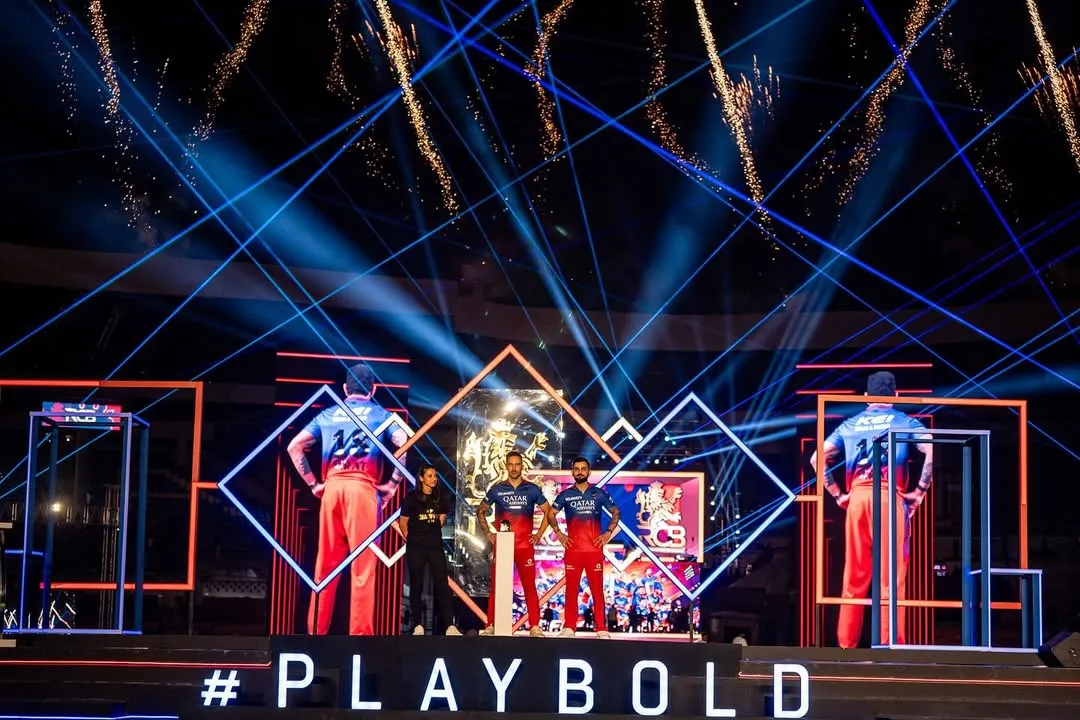 The stage is set for an electrifying RCB Unbox event. This image captures the culmination of our production design, featuring dynamic lighting, custom staging, and pyrotechnics that create a high-energy atmosphere for thousands of fans and players.