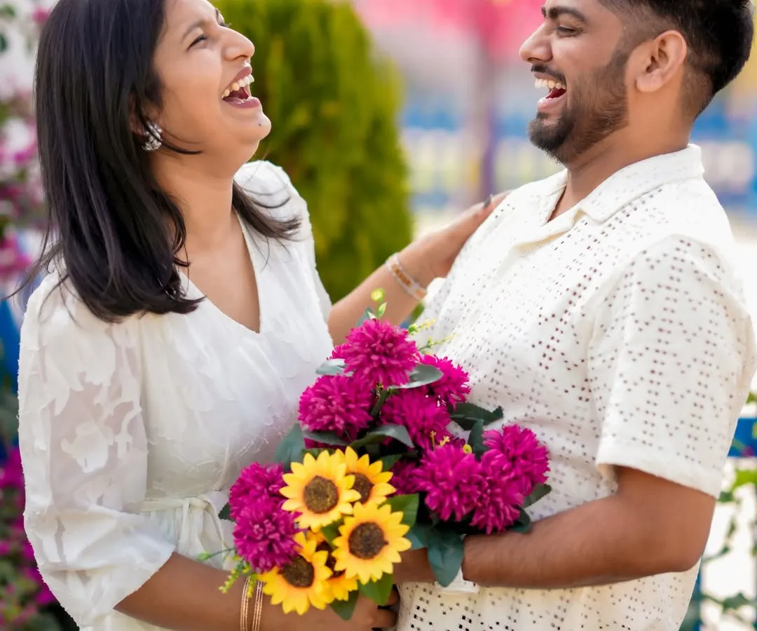 This is what pure, unfiltered joy looks like. My goal is to create a relaxed space where you can be yourselves, and I can capture the real laughter and connection you share. This candid shot from a Pune pre-wedding session, with its warm light and genuine smiles, is the heart of my natural photography style.