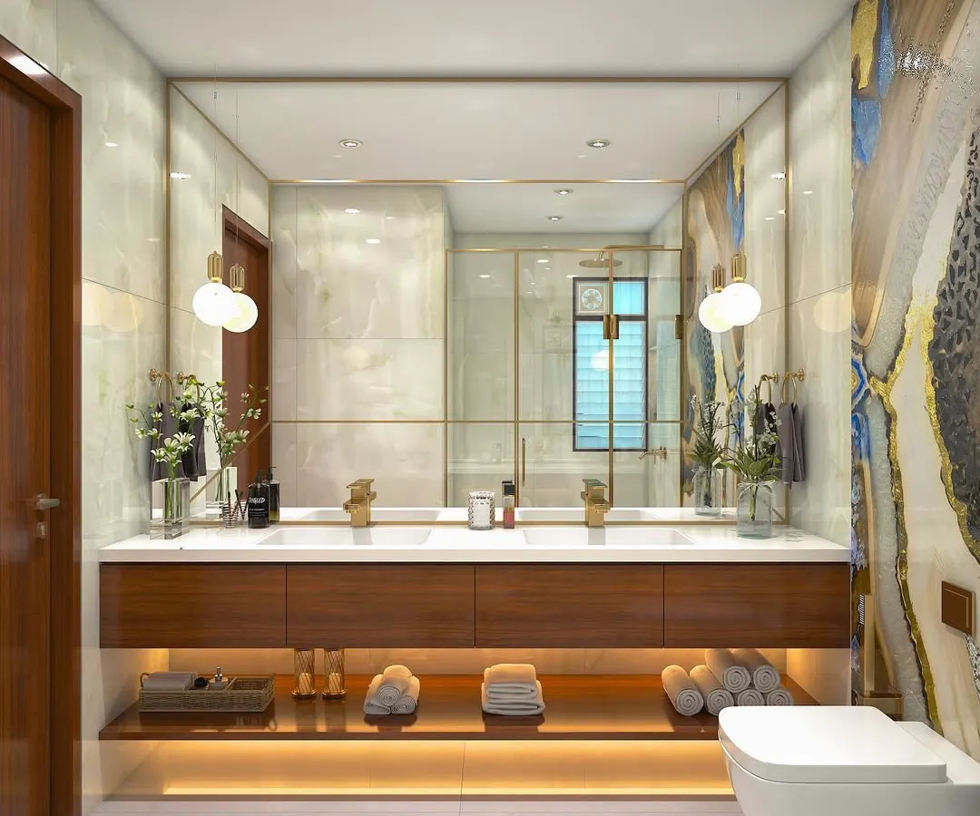 I believe bathrooms should be personal sanctuaries. This spa-style master bathroom features a floating dual vanity with warm under-lighting, a striking blue and gold agate-patterned wall, and a spacious glass shower enclosure for a truly luxurious feel.
