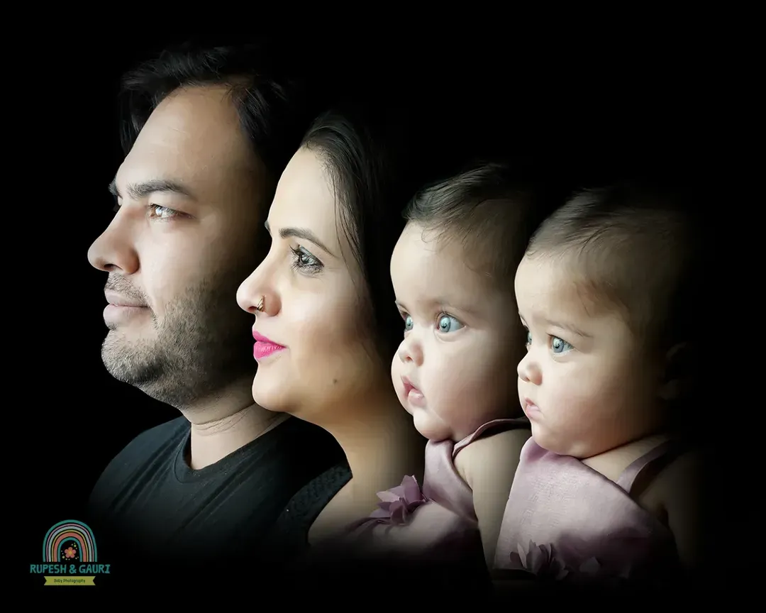 A creative family portrait telling a story of generations. We designed this dramatic silhouette shot to highlight the beautiful connection between the parents and their precious twin baby girls.