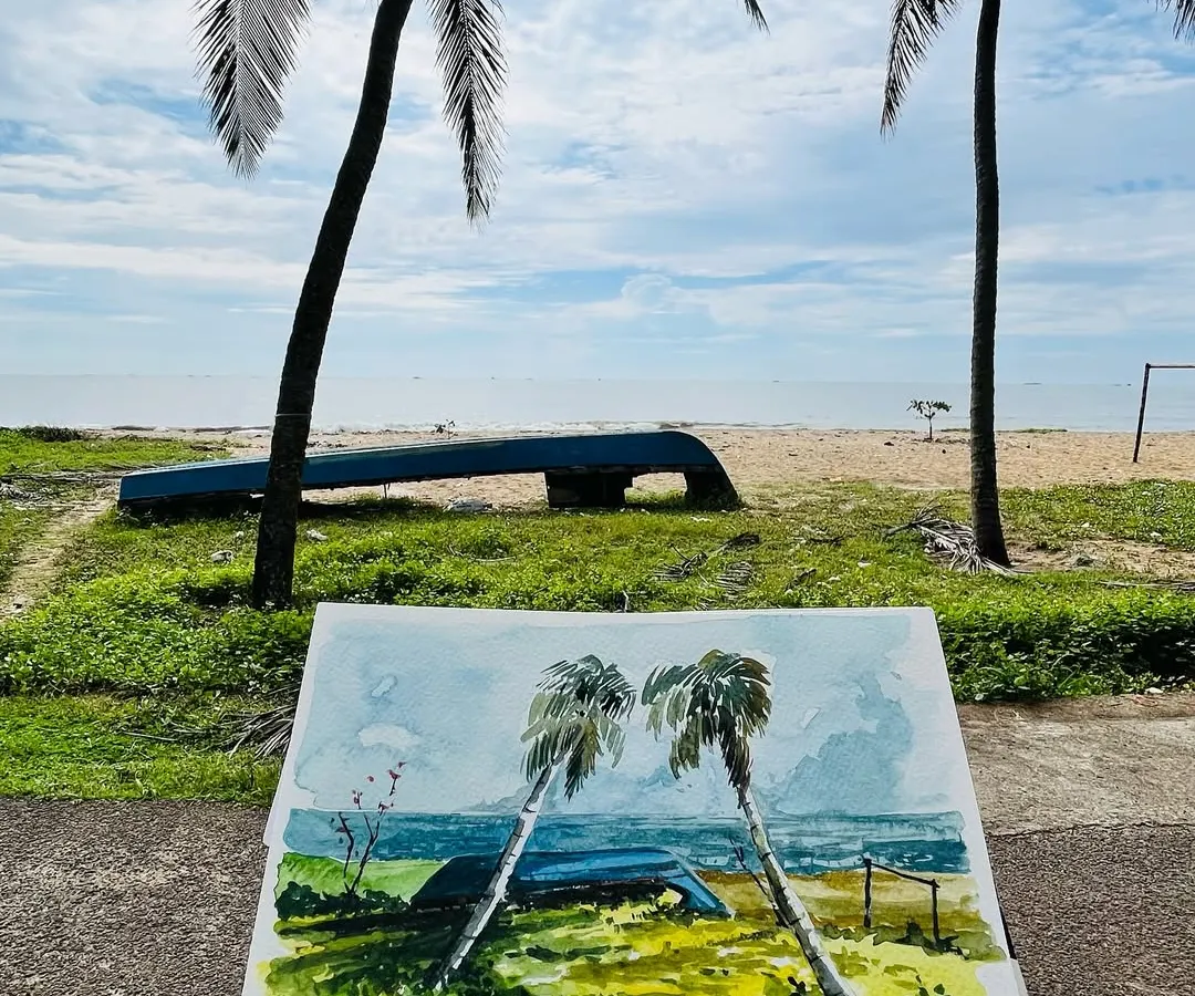 This is my hometown beach in Tanur, Kerala, captured in watercolor. Holding up the finished sketch against the very scene that inspired it feels like holding a memory in my hands. It’s this feeling of connection to a place that I strive to bring into every piece.