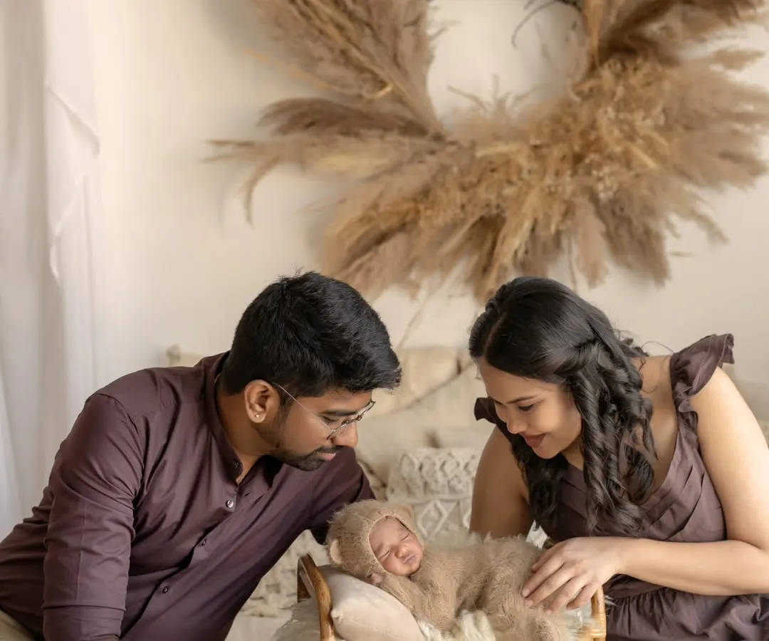 Welcoming a new life is a story of love. I love creating these first family portraits, capturing the awe and affection as parents gaze upon their newborn for the first time.