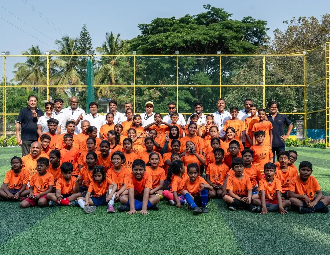 Our camp is a community. This is our family photo from the 2025 camp finale, bringing together campers, dedicated coaches, and supportive parents. It's a testament to the spirit and camaraderie we build together.