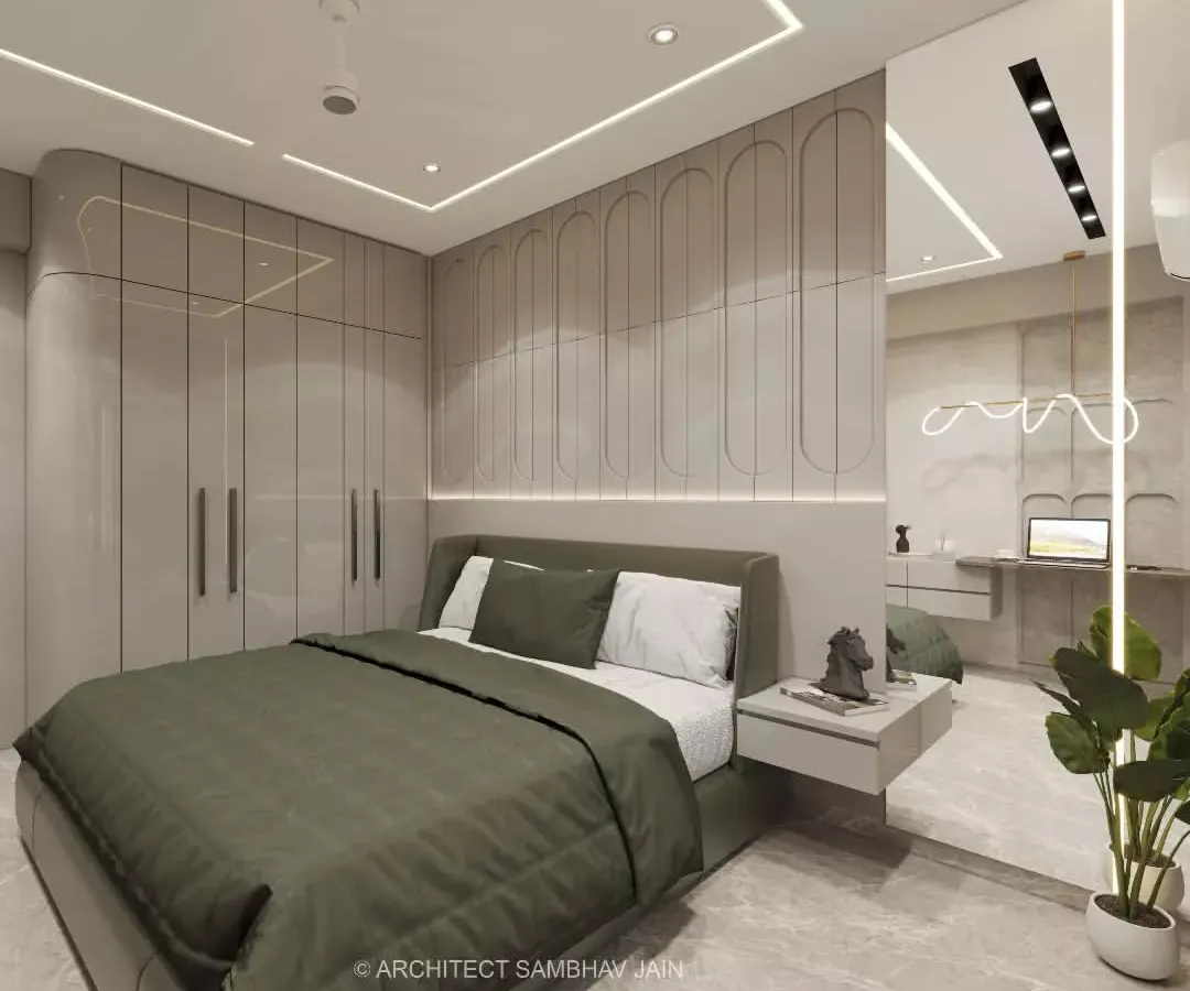 I believe a bedroom should be a sanctuary. Here, I designed seamless, curved wall paneling and integrated wardrobes to create a clean, uncluttered look. The combination of soft, ambient lighting and an earthy color palette makes this room a perfect retreat for rest and rejuvenation.