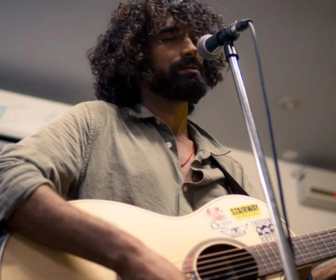 We love providing a stage for passionate singer-songwriters to connect with an audience. Here's a powerful moment from an acoustic set, where every note and lyric could be felt throughout the room.