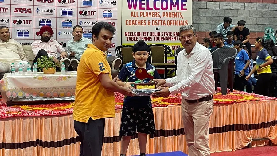 And this is the result of that focus. Here is my 8-year-old player, Mehransh Singh Bhatia, proudly receiving his silver medal at the 1st Delhi State Ranking Tournament. Hard work always pays off.