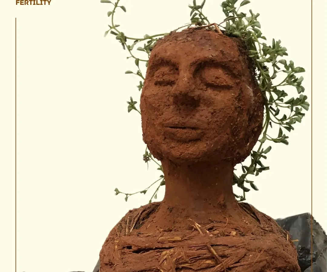 This sculpture, titled 'Dirty Fertility', was created from soil to explore the connection between Mother Earth and the sacredness of the female body. My art often delves into these deeper themes, using natural materials to question our conditioning and find beauty in what's raw and real.