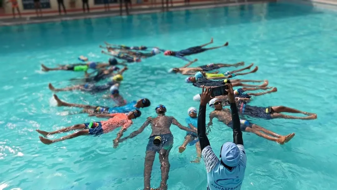 We find calm and balance during our special Aqua Yoga sessions. Here, participants are in a floating Savasana, using the water's natural buoyancy to achieve deep relaxation and release tension.
