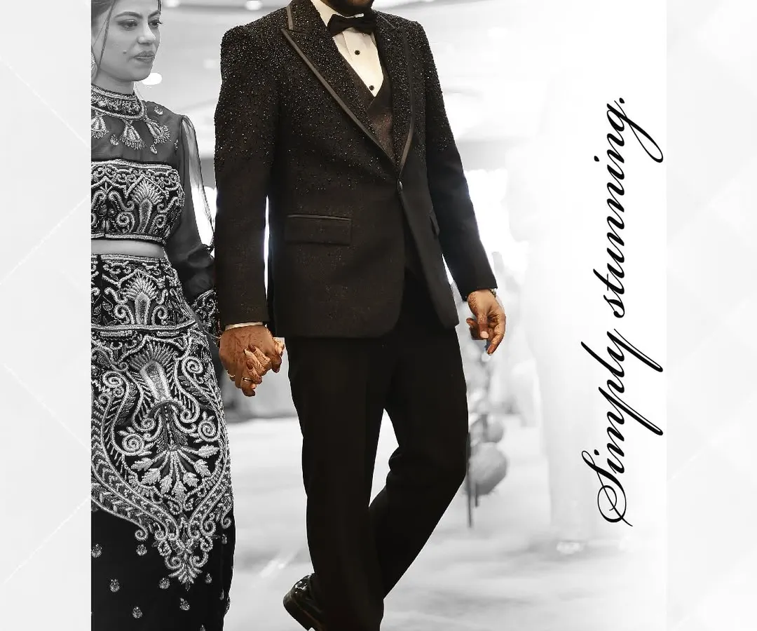 For the modern groom who walks with confidence. This bespoke tuxedo, featuring a textured jacket with satin lapels, is crafted to make your most important moments truly unforgettable. Every stitch tells a story of personal style.