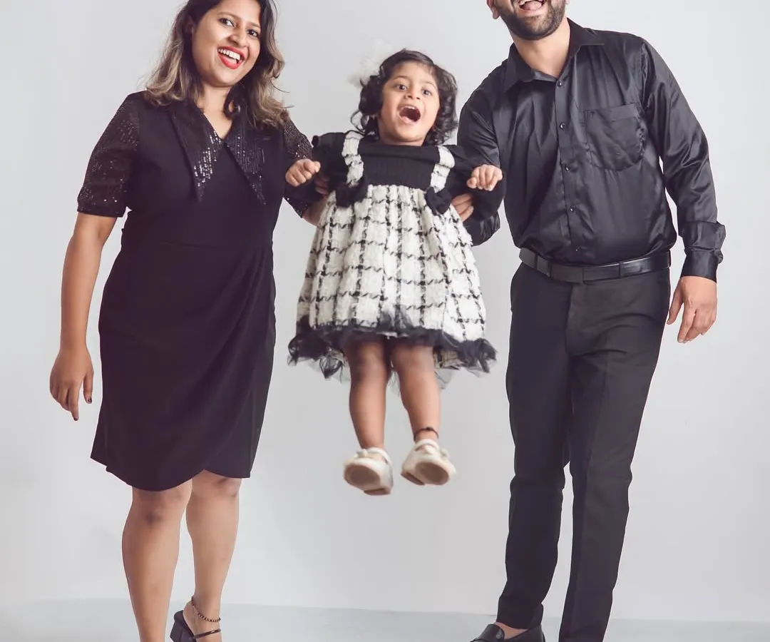 We love the pure joy in this shot. Our studio sessions are all about having fun and letting your family's energy shine, creating memories you'll laugh about for years.