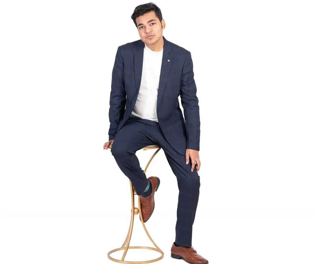 A classic men's portfolio shot, perfect for actors and models. I used clean, high-key lighting against a simple white backdrop in my studio to create a sharp, professional image focusing on the model's expression and the fit of the suit.
