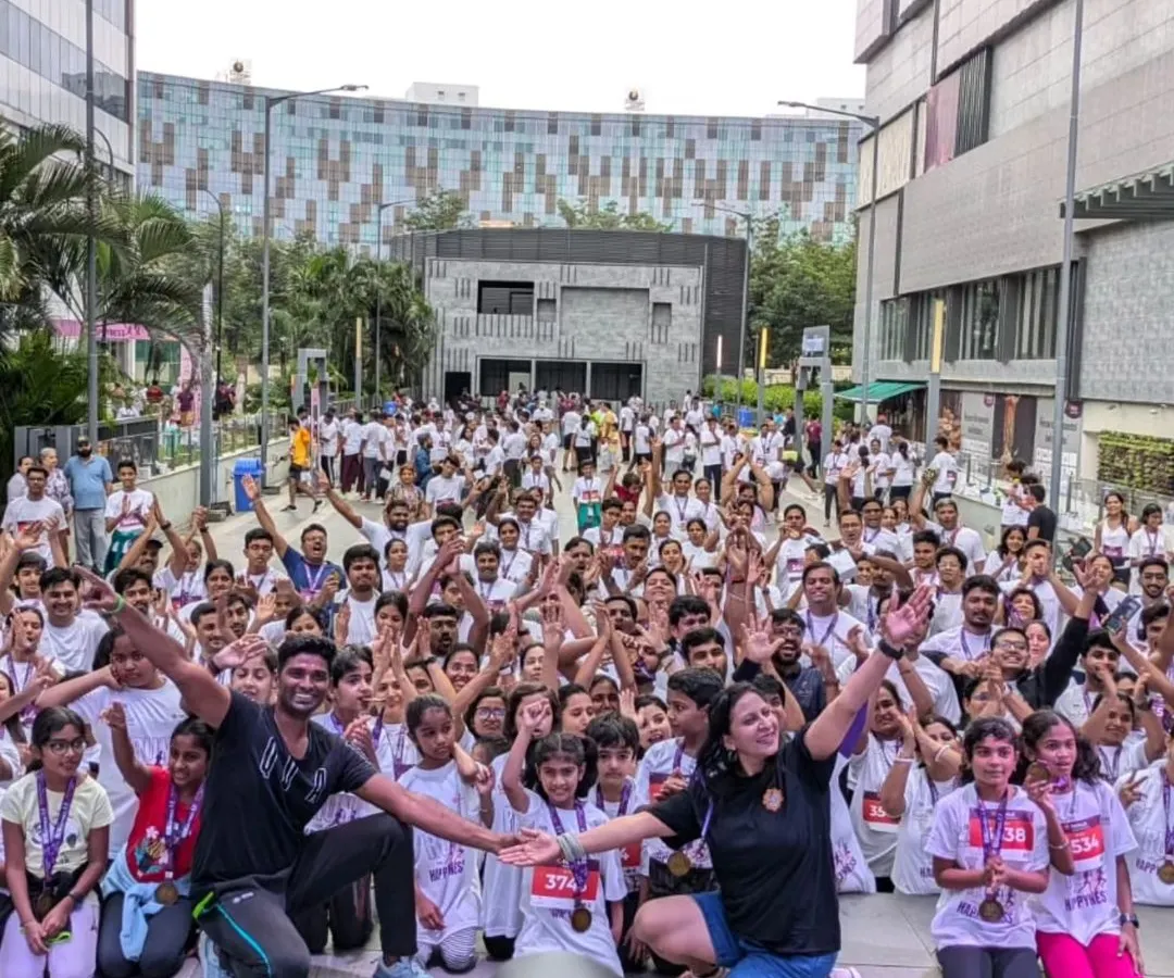 The energy of our community is everything. This is a snapshot from our "Run for Happiness" marathon warm-up, where hundreds of people came together at dawn to move, sweat, and prepare for a run that supports great causes.