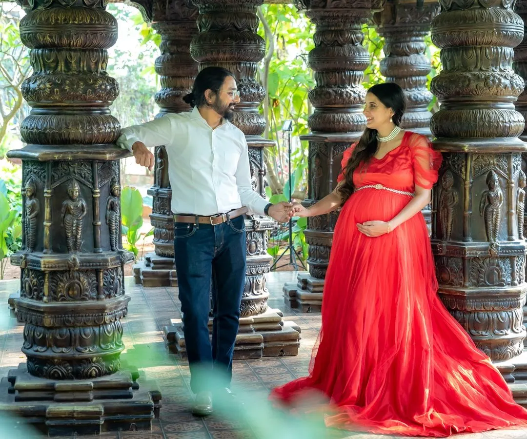 We believe maternity photos are about celebrating your connection. This romantic portrait captures a quiet moment between the parents-to-be, framed by the beautiful architecture of one of our favorite outdoor locations.