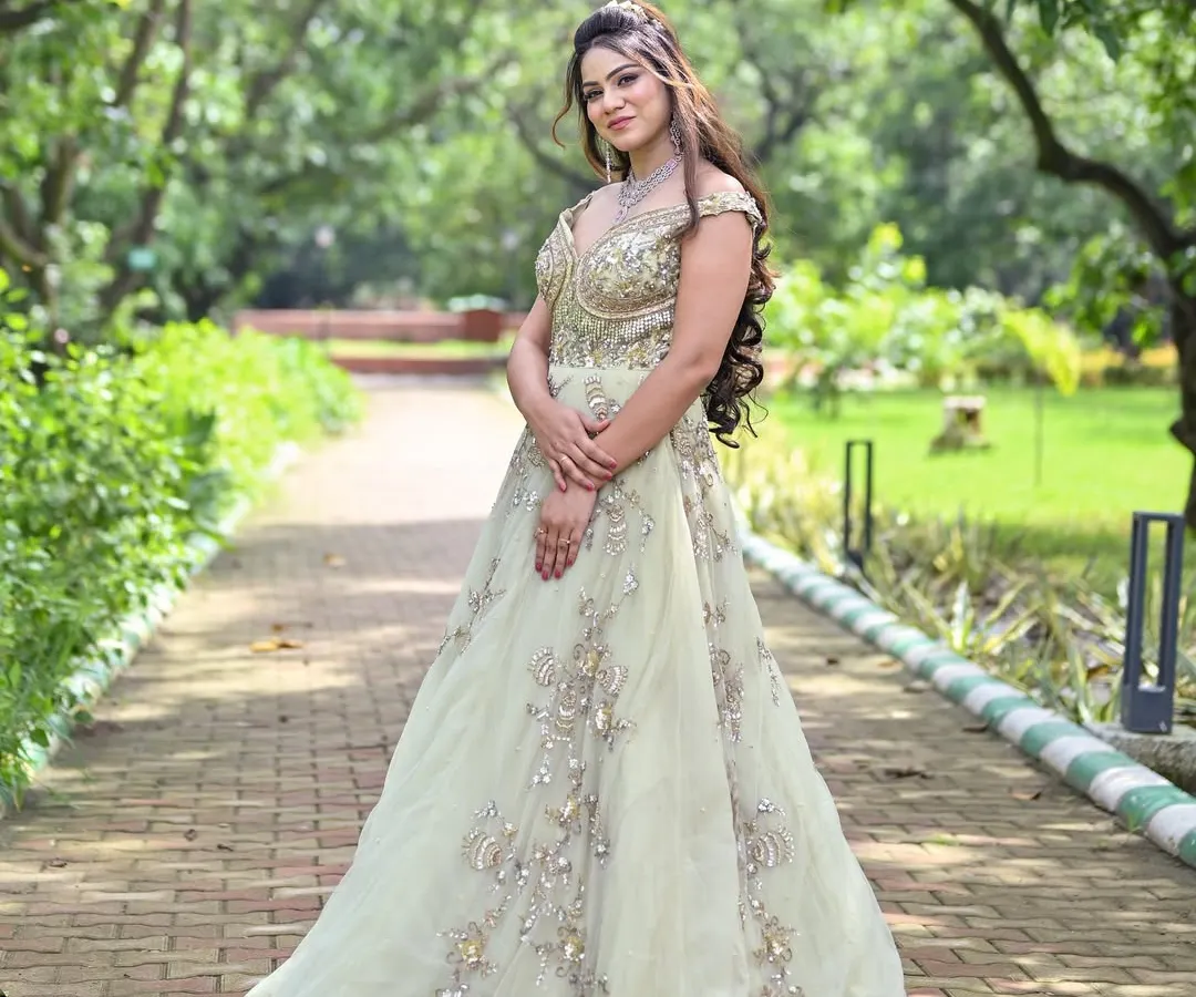 Feel like a princess in this breathtaking pastel gown, perfect for a reception or engagement. The intricate embroidery and flowing silhouette create a magical look, ensuring all eyes are on you.