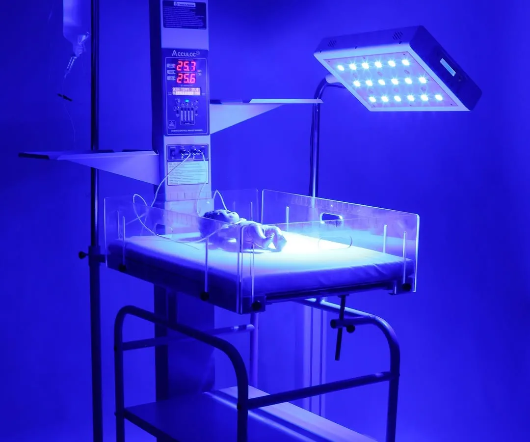 Our studio is equipped for specialized photoshoots, including technical medical equipment. This shot of a neonatal warmer with its phototherapy light activated demonstrates our ability to capture products in their functional state, highlighting key features for professional catalogs and websites.