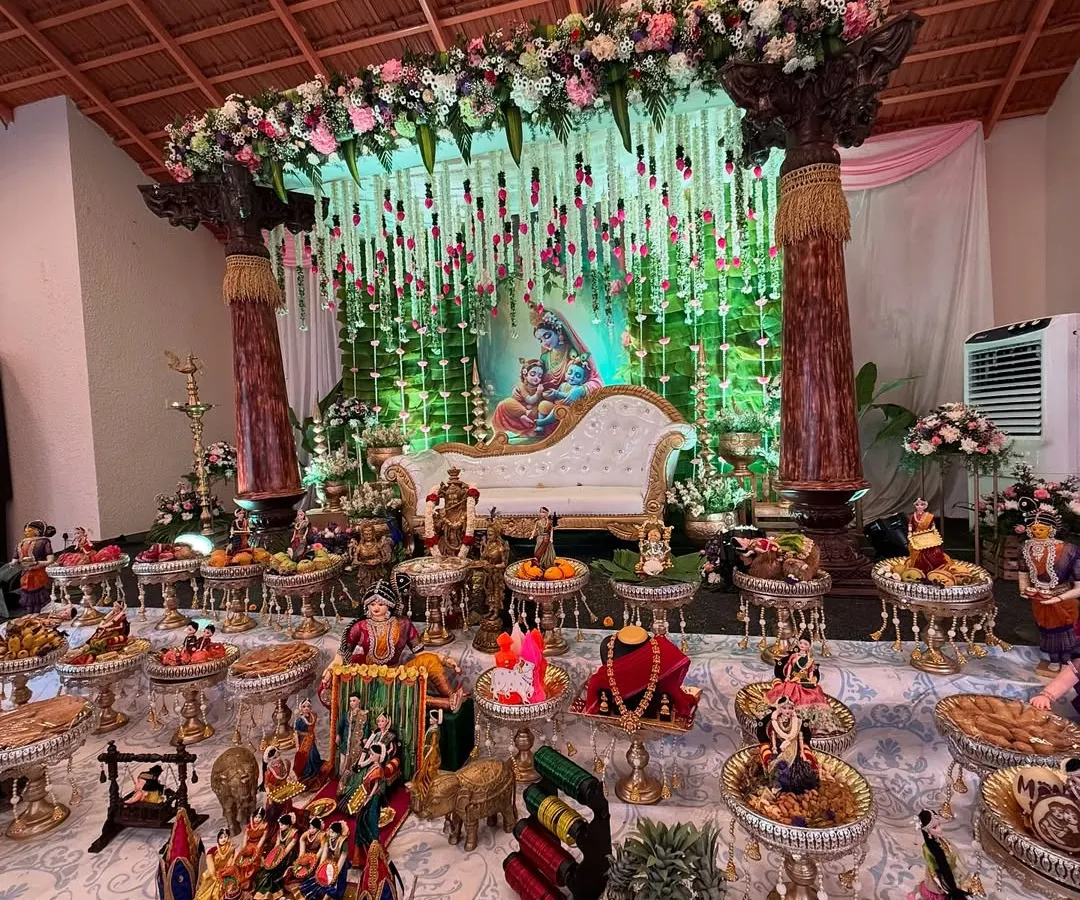 A traditional baby shower (Seemantham) with a touch of grandeur. We created a beautiful stage with a Lord Krishna backdrop, hanging floral strings, and an elaborate display of traditional offerings, making it a truly divine and memorable celebration for the family.