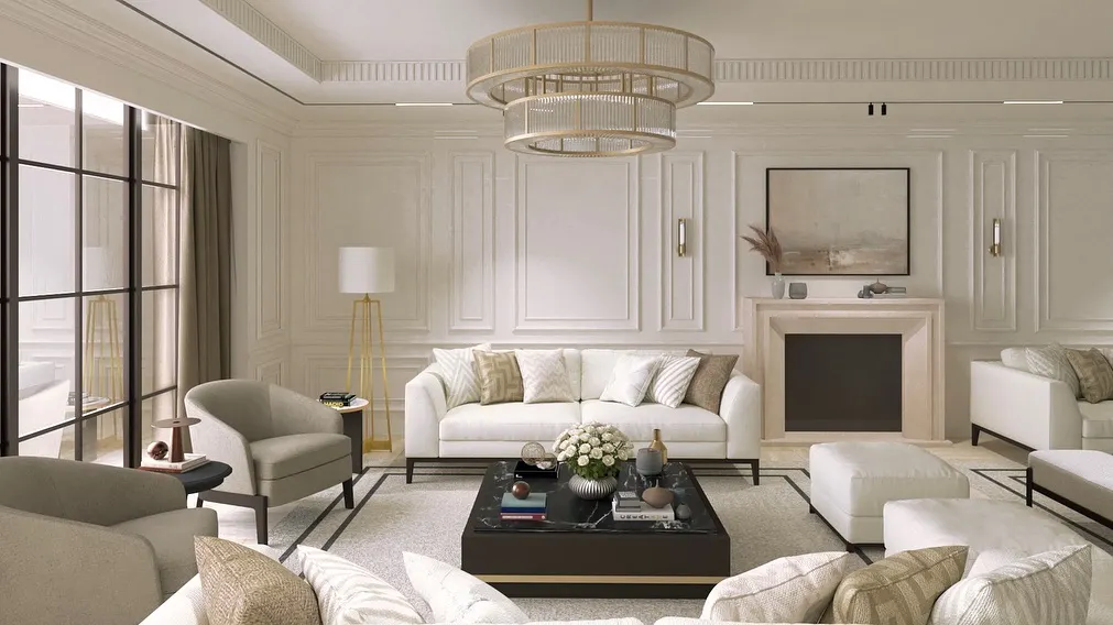 We designed this neo-classical drawing room to be a space of refined living. The design uses classic wall mouldings, a grand chandelier, and a symmetrical layout to achieve a timeless elegance that feels both luxurious and welcoming.