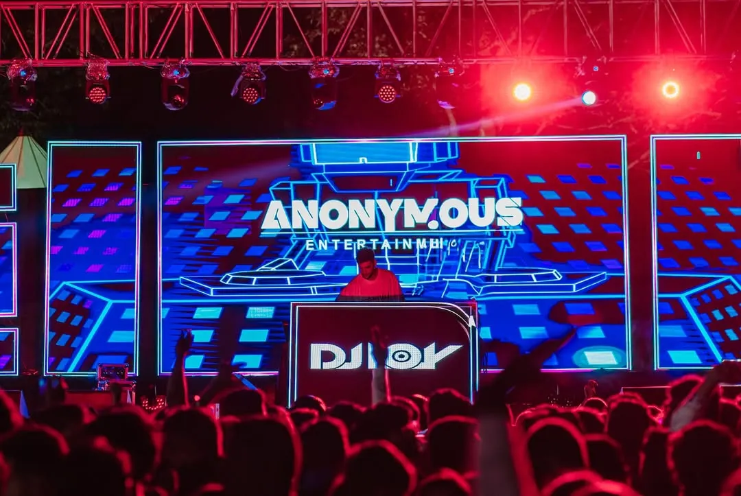 My name in lights on a huge LED wall is more than just branding. It's a promise of a complete audio-visual show where I sync every beat with custom graphics, making the visuals as important as the music.