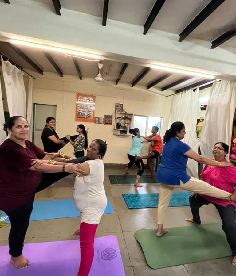 The joy of practicing together is unmatched. In my group classes, we often use partner work to build trust, support, and balance, proving that yoga has no age limit. It's all about finding energy and breathing together.