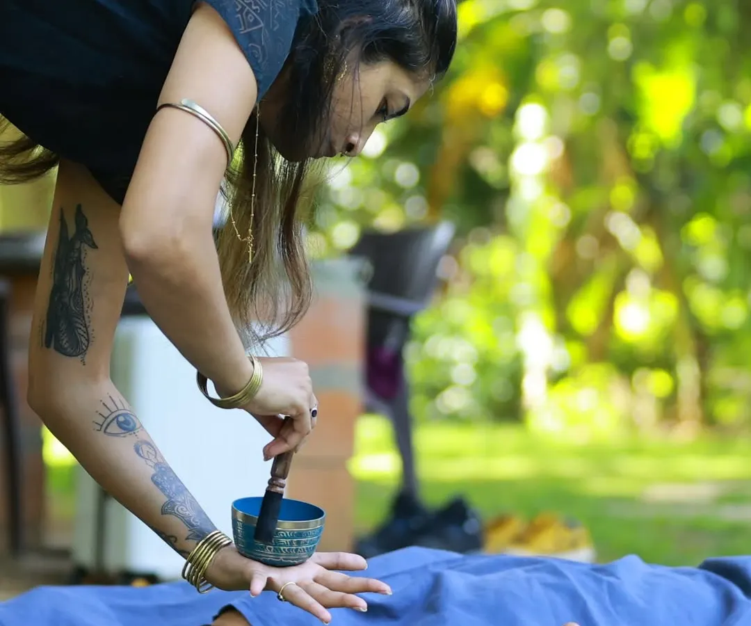 This is the heart of sound healing. I use the pure vibrations of Tibetan singing bowls, placing them on the body to help release tension stored deep within your cells. It’s a gentle yet powerful way to reset your nervous system.
