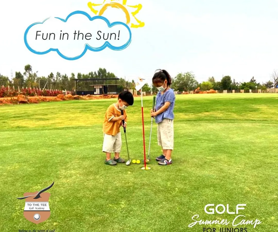 The joy of golf starts early at our academy. This shot from our Junior Summer Camp captures two young learners discovering the fun of putting, building a positive foundation for their journey in the sport.