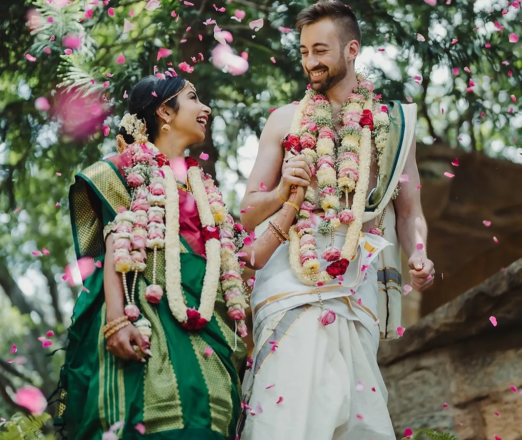 The pure joy of a cross-cultural union, as Namratha and Luke are showered with petals. Our venue thrives on moments like these, where love beautifully bridges two worlds.