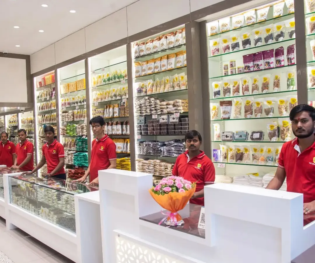 Welcome to my shop! I wanted to give you a peek inside where all the magic happens. My team and I are always ready to help you find exactly what you're looking for. We keep the shelves stocked with the freshest sweets, snacks, and dry fruits.