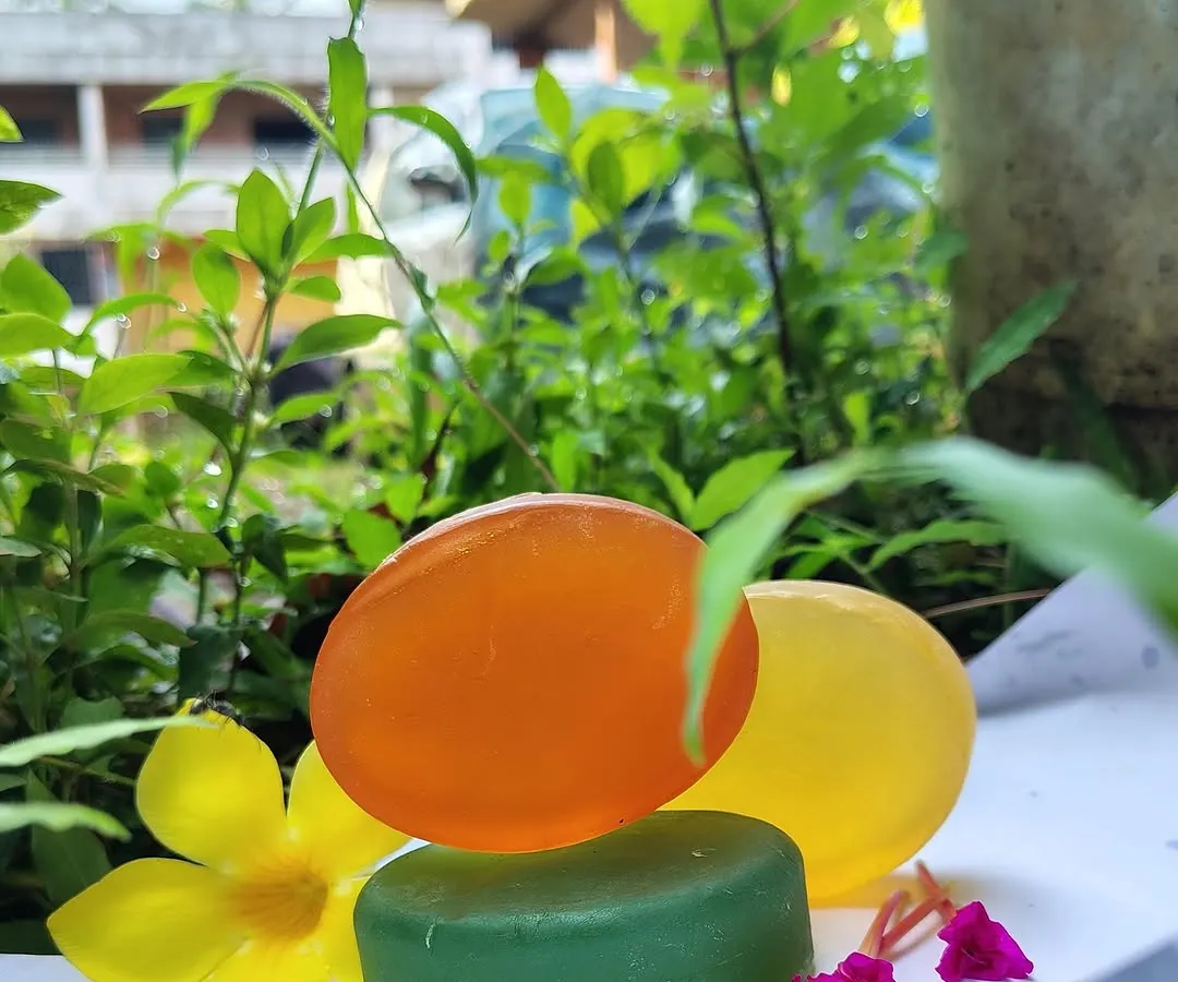 My handmade herbal soaps, pictured here in their natural element. These bars are made with ingredients like Tulsi and Neem and come in Lemon, Jasmine, and Sandalwood fragrances for a gentle, natural clean.