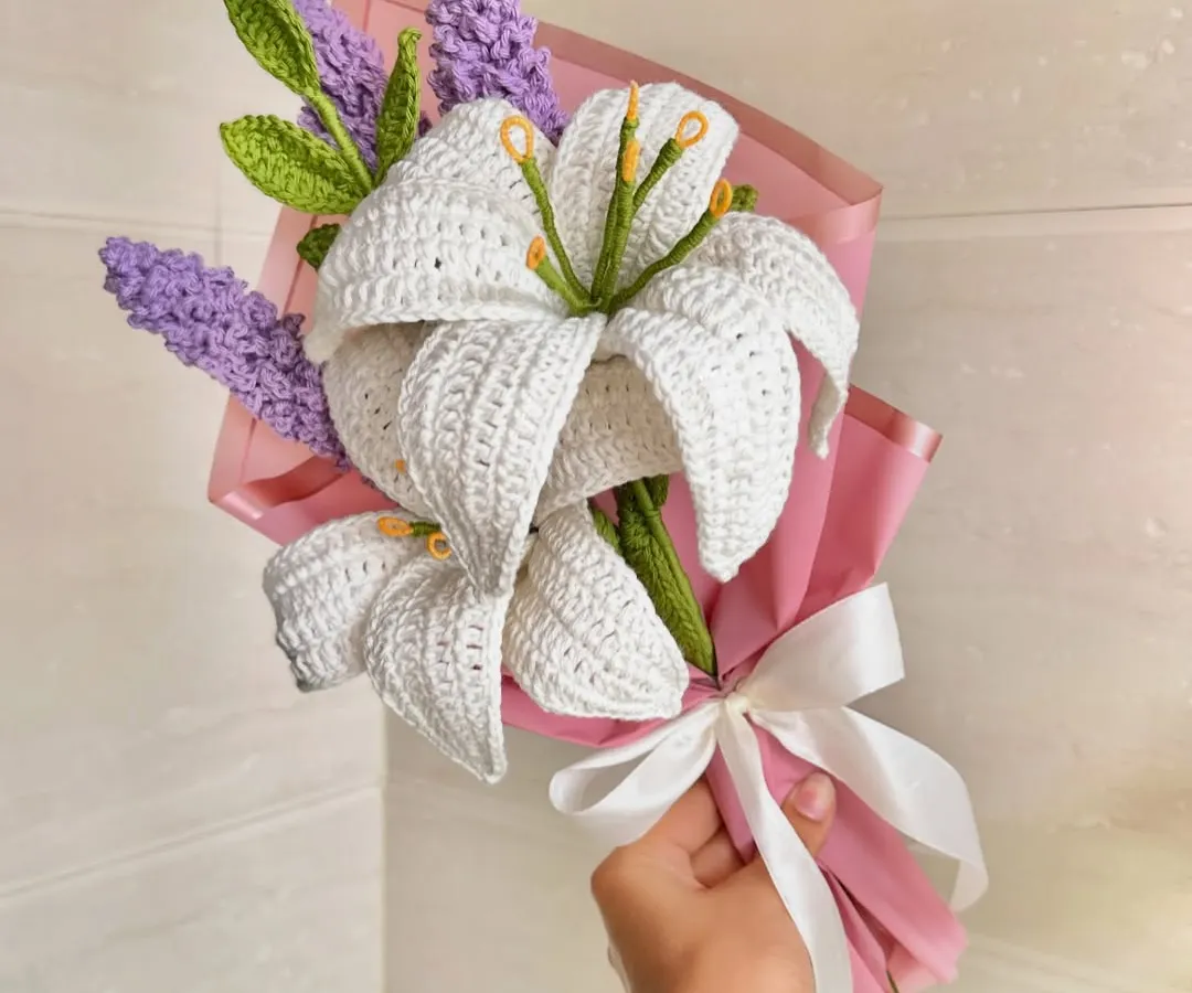 A beautiful custom bouquet featuring handcrafted crochet lilies and lavender. This shows the intricate detail and artistry we put into our floral arrangements, making them a perfect everlasting gift for special occasions like Valentine's or Galentine's Day.