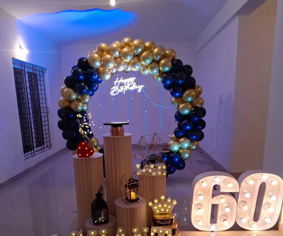Celebrating a 60th birthday is a huge milestone, and it deserves an elegant touch. For this setup, I used a classic royal blue and gold theme with a large balloon ring, marquee numbers, and custom name lighting to create a sophisticated and personal backdrop for the celebration.