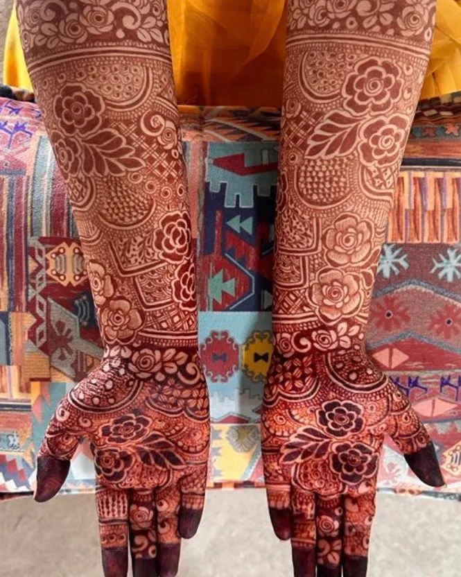 Here you can see the rich, dark color of my organic henna after it has matured for 24 hours. I love creating these full-arm bridal designs, filled with detailed floral and traditional patterns that are unique to each bride.