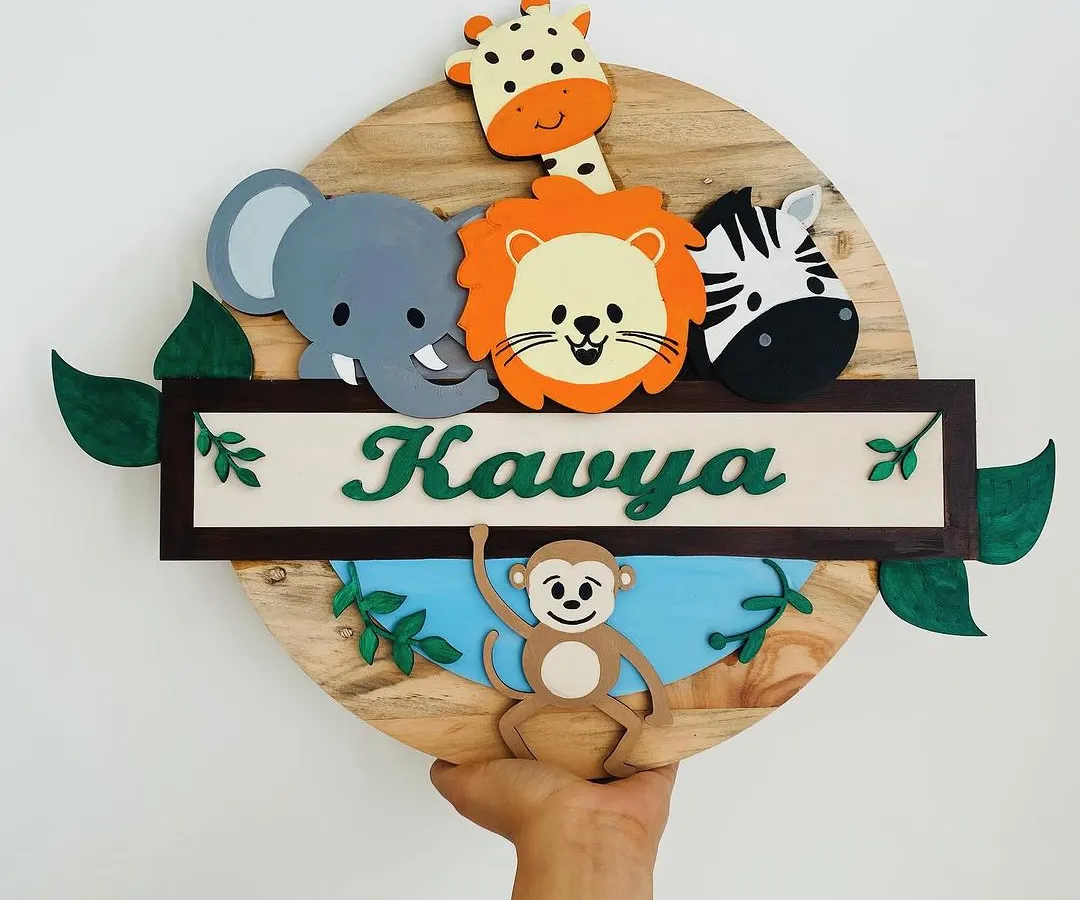 Bring the adventure indoors with a custom jungle-themed nameplate for your little one's room. Each animal is hand-painted on wood, creating a playful and personal piece of decor that sparks imagination.
