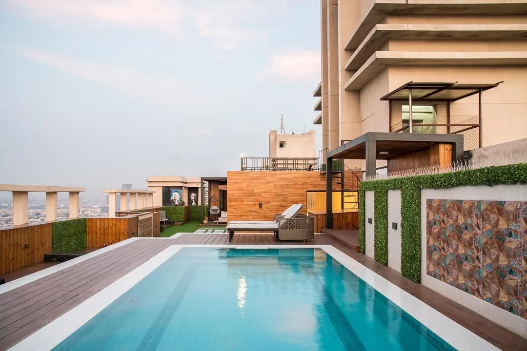 I believe a home should be a retreat, and this penthouse rooftop is the ultimate urban oasis. I designed this space with a pool, custom decking, and comfortable lounge areas to be perfect for both quiet relaxation and entertaining guests against the city skyline.