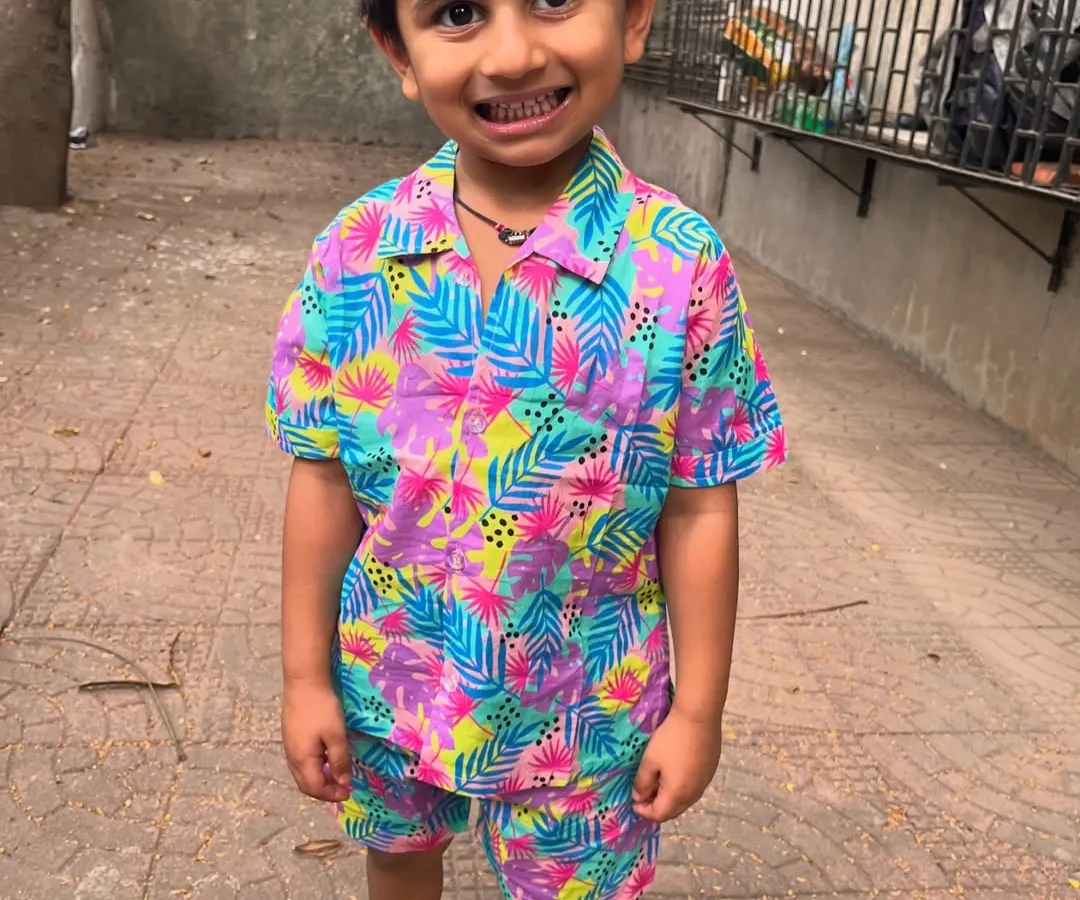 Just look at that smile! This is what happens when comfort meets cuteness. Our tropical print co-ord set is made from 100% breathable cotton, perfect for your little explorer's biggest adventures, even on the warmest Indian days.