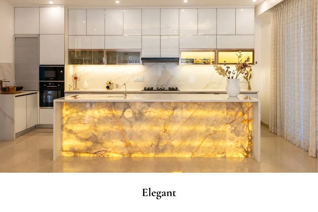 The kitchen can be a home's most dramatic showpiece. For this design, I used a backlit onyx island as the glowing centerpiece. It combines high-end luxury with everyday practicality, creating a space that is both a functional cooking area and a stunning work of art.