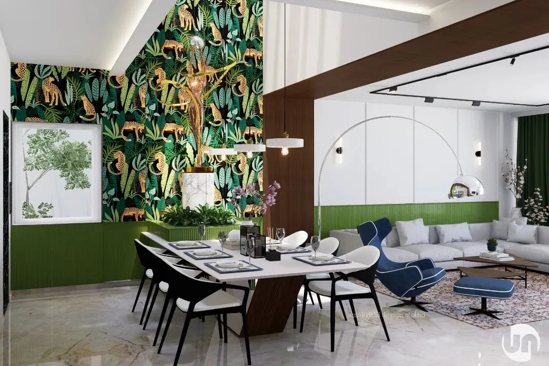 I designed this first-floor living area to be the emotional hub of the home. The open layout connects the living, dining, and kitchen spaces, ensuring family members can interact and share experiences, fostering a true sense of togetherness and modern luxury living.