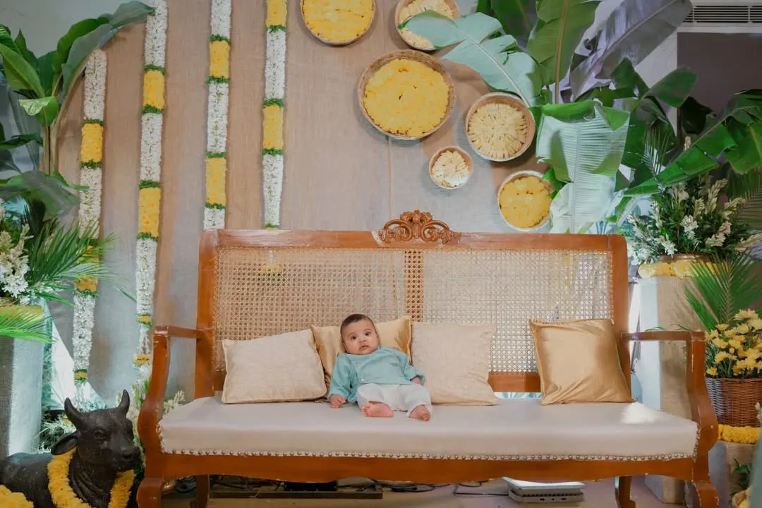 Welcoming a little one into a world of new tastes and traditions. For this Annaprashan, we used earthy elements like cane, jute, and marigolds to create a warm, serene atmosphere for the baby's first meal.