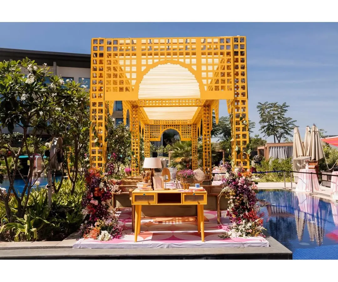 I believe pre-wedding events should be just as spectacular as the main day. This vibrant, poolside Mehndi setup was designed to bring a bride's boho-chic dream to life, creating a perfect sundowner experience.
