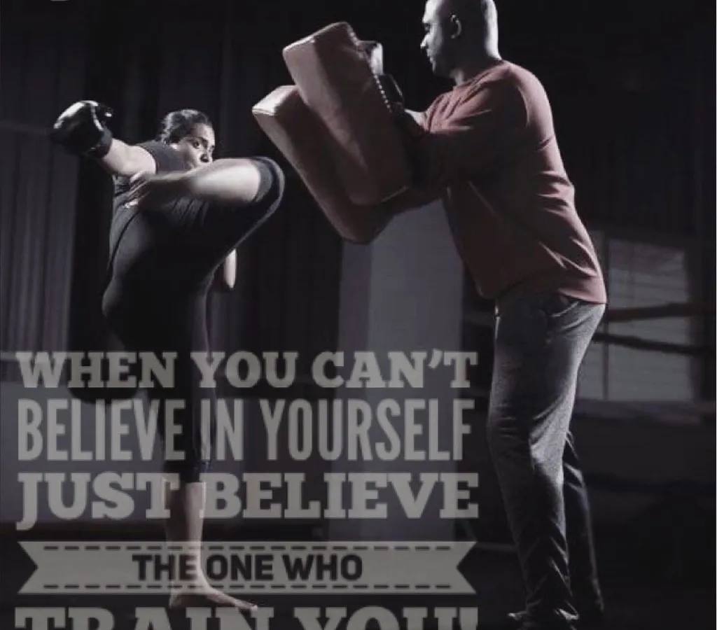 I believe in your potential even when you doubt yourself. This image shows a one on one kickboxing drill, focusing on proper form for a high kick. My role is to guide and push you to master techniques that build both skill and confidence.