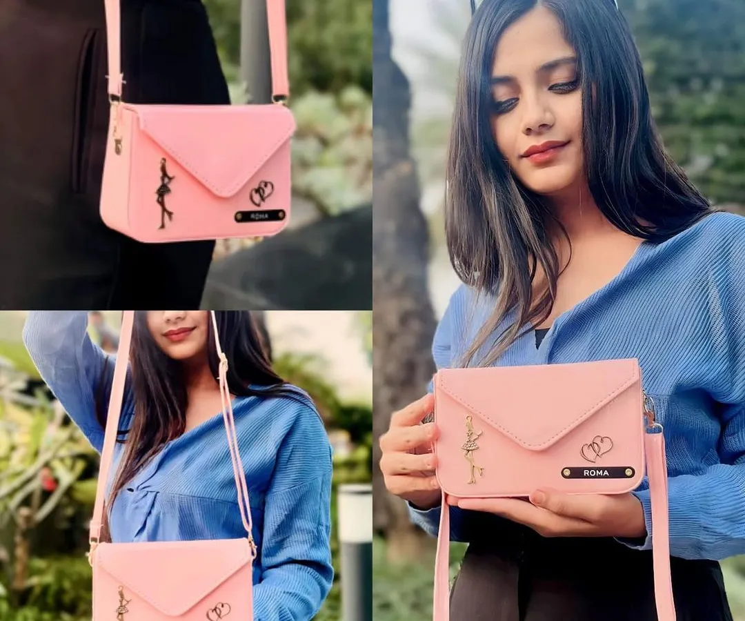 Here is my personalized envelope sling bag in baby pink, shown in action. You can customize it with a name and two charms of your choice, making it a unique and stylish accessory for everyday use or a special gift.