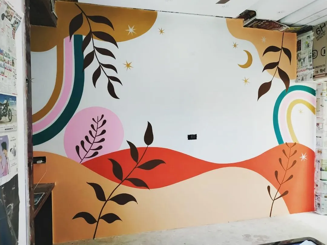 A hand-painted wall mural designed to bring energy and color into a modern space. This abstract piece uses a palette of warm and cool tones, organic shapes, and celestial elements to create a playful and artistic focal point.