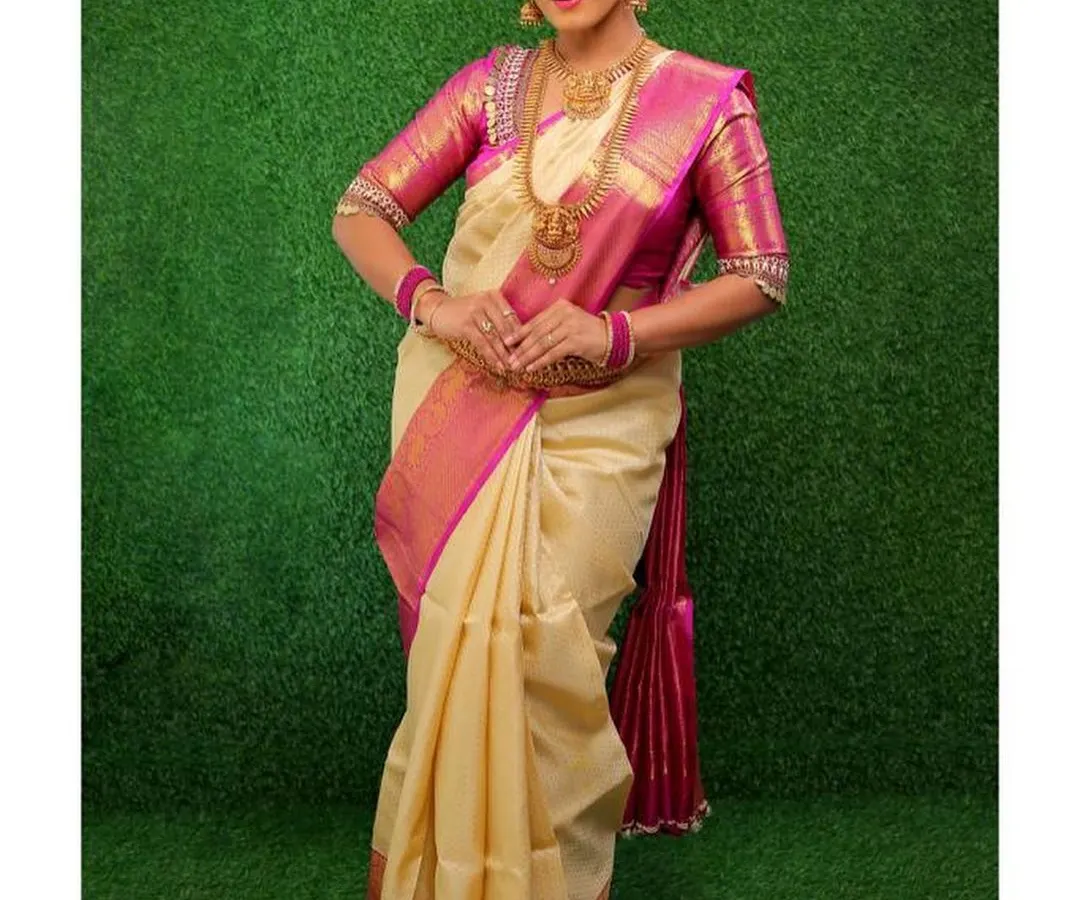 This is the complete picture of a traditional bride. The makeup is designed to harmonize with the rich texture of the Kanjivaram saree and the intricate details of the jewellery, creating a cohesive and regal wedding day look.