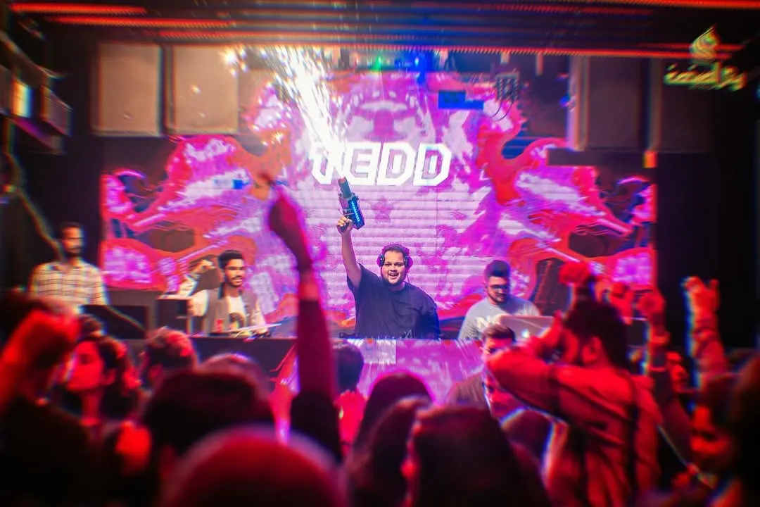When I'm on the decks, I bring the full show. This is me with a CO2 cannon, creating pure mayhem and ensuring the energy on the dance floor is explosive.