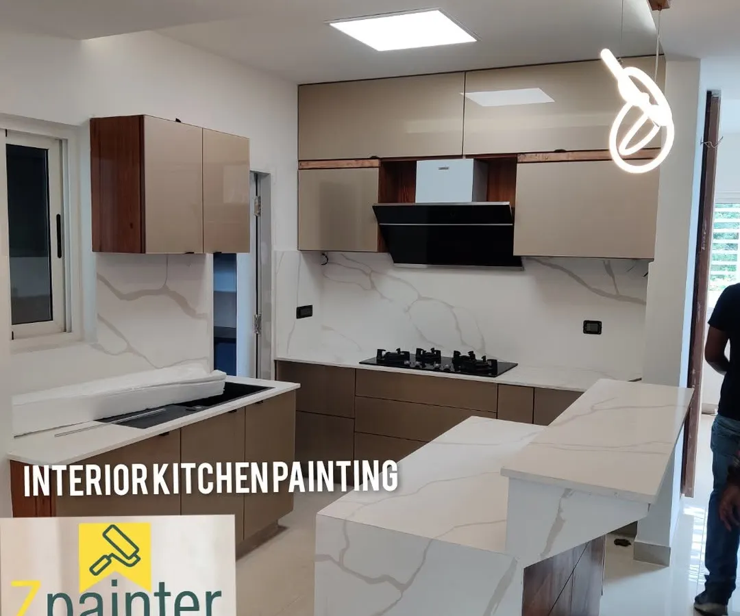 A full kitchen transformation featuring sleek, painted cabinets. We used a durable, high-gloss paint for a modern look that is easy to clean and resistant to daily wear and tear.