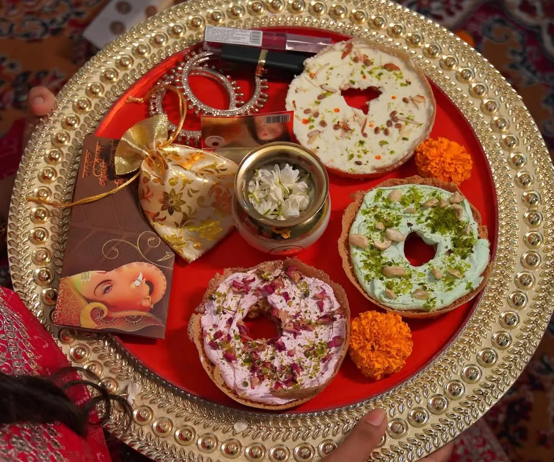 This is what Teej traditions look like in our family. A beautiful thali featuring our special Ghewars, passing down love and sweetness from one generation to the next. It’s more than just a sweet, it’s a feeling. 🧿