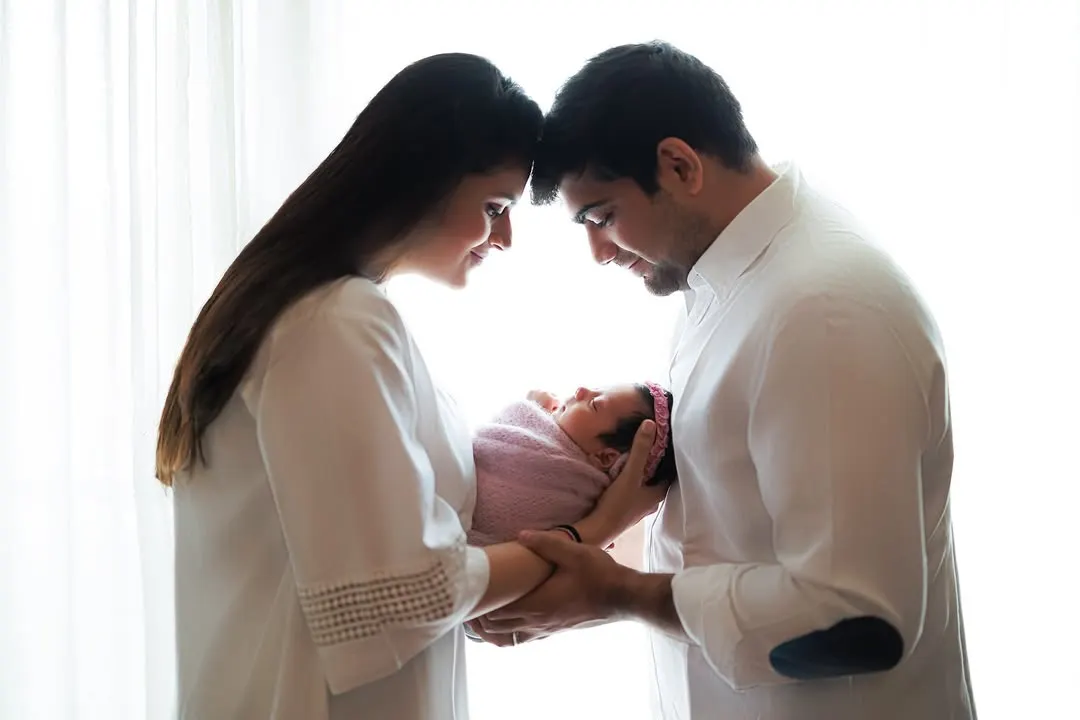 There is so much love in the quiet moments right after a baby arrives. I love using soft, natural light to capture the beautiful connection between new parents, creating a timeless portrait of your new family.
